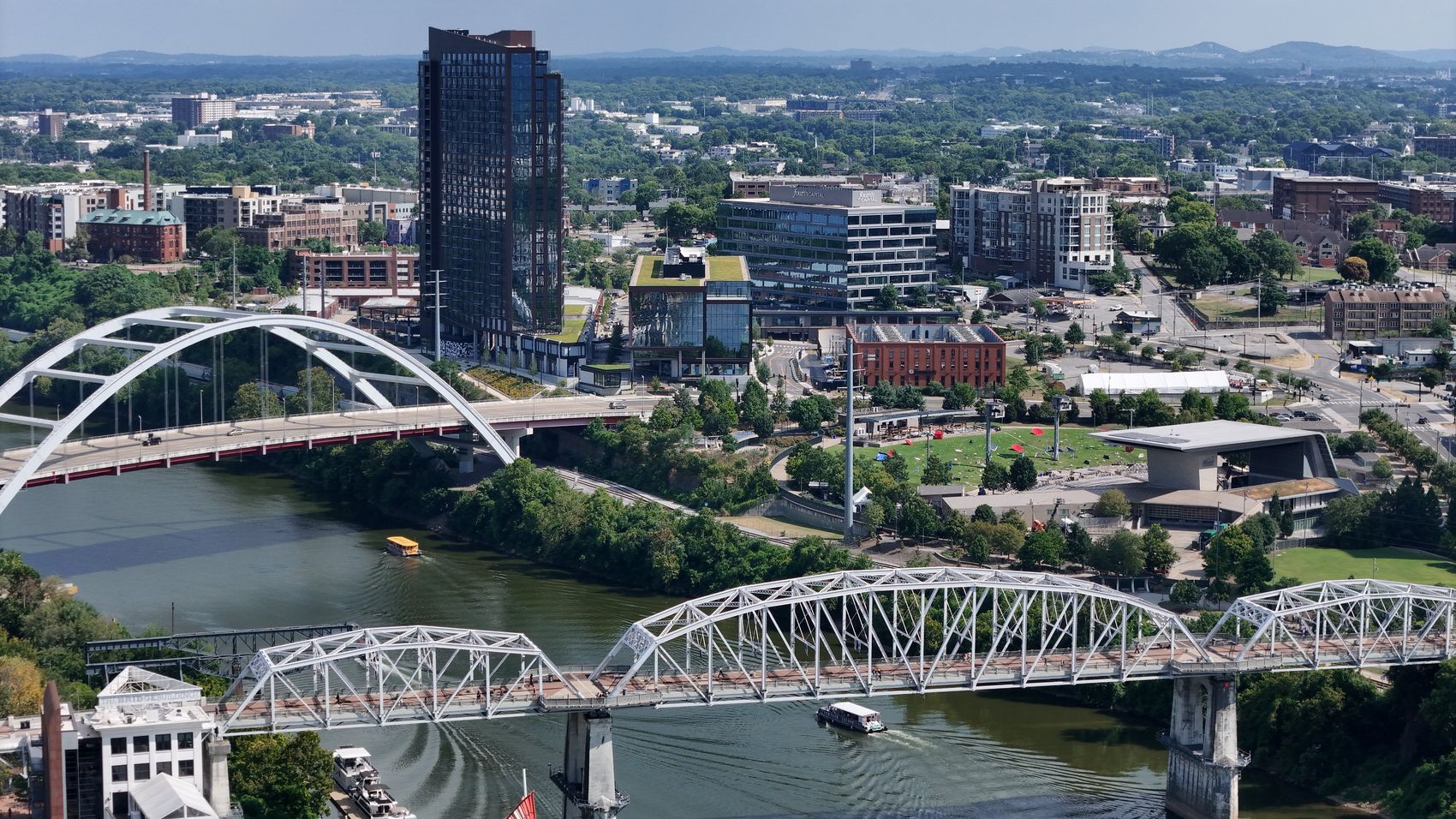 Aerial of the Cumberland River and Nashville's pedestrian and memorial bridges